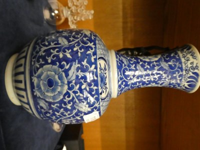 Lot 118 - A Chinese blue and white bottle vase, floral design; together with a Chinese famille verte...