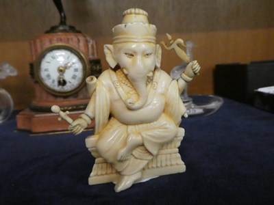 Lot 120 - A Japanese ivory figural okimono, Meiji period; with an early 20th century Indian ivory figure...