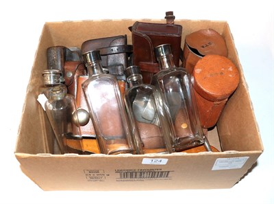 Lot 124 - A group of hunting related items including: flasks; leather cased hunting cups and cigarette boxes