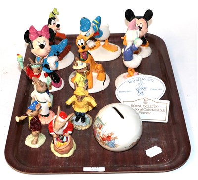 Lot 131 - Six Royal Doulton figures from the Mickey Mouse collection, six Royal Doulton Bunnykins figures etc
