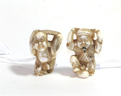Lot 154 - A Japanese ivory netsuke, Meiji period, as Daikokuten standing, his hands on his head, signed,...