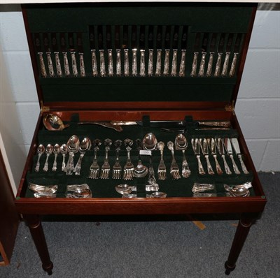 Lot 155 - A modern E.P.N.S Kings pattern canteen of cutlery in a mahogany canteen raised on four legs