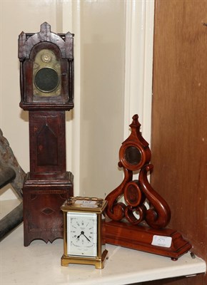 Lot 157 - Two pocket watch holders, late 19th century, and a 8 day carriage timepiece with dial inscribed...