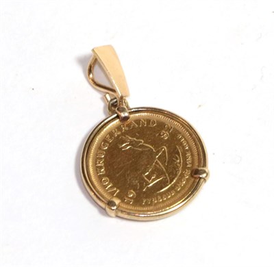 Lot 165 - A 1/10 gold Krugerrand, dated 1982 loose mounted in a gilt metal pendant mount