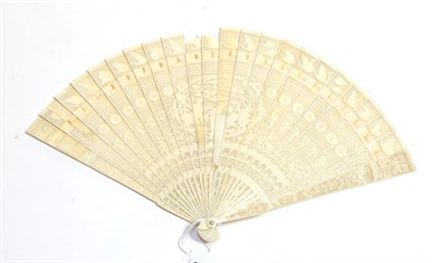 Lot 173 - An early 19th century Chinese carved ivory brisé fan, the twenty-one inner sticks and two...