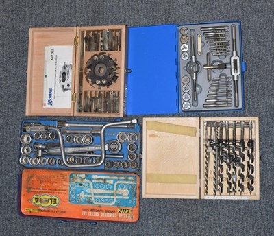 Lot 188 - Four sets of modern tools: drills, tap and dye set, profile cutter and socket set
