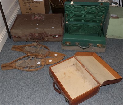 Lot 192 - A leather suitcase and a travelling vanity case, each with canvas covers bearing old Cunard...