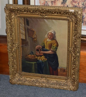 Lot 323 - After Johannes Vermeer (1632-1675) Dutch, The Milkmaid, bears signature, oil on canvas, 49.5cm...