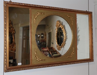 Lot 344 - A gilt framed sectional mirror, the circular convex central mirror flanked by rectangular plates