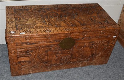 Lot 357 - A Chinese carved camphor wood chest