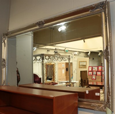 Lot 377 - ^ A reproduction silvered hall mirror