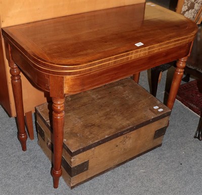 Lot 392 - A 19th century cross banded and inlaid mahogany fold-over tea table; together with a metal...