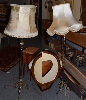 Lot 396 - A brass rope twist standard lamp and silk shade; together with a reeded brass and onyx standard...