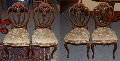 Lot 398 - A set of four mahogany balloon back chairs