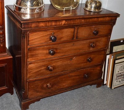 Lot 405 - A George III mahogany chest of drawers, the moulded rectangular top over two short drawers...