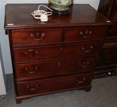 Lot 409 - A George III mahogany four height chest of drawers, raised on bracket feet, 88cm by 48cm by...