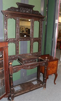 Lot 411 - ^ A Victorian carved oak mirrored hall stand, together with a bedside cupboard (a.f.), 92cm by 31cm