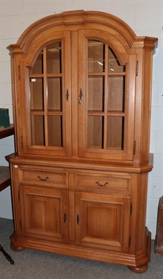 Lot 417 - A 20th century oak glazed bookcase cabinet, 131cm by 55cm by 214cm high