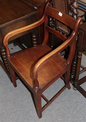 Lot 433 - A George III mahogany plank-seated open armchair