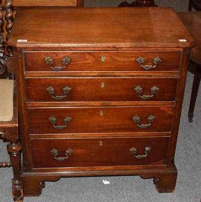 Lot 445 - A George III mahogany four height chest of drawers with fluted stiles and bracket supports,...