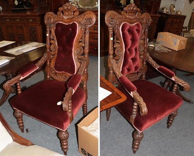 Lot 452 - A pair of Victorian carved oak open armchairs