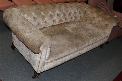 Lot 456 - A mahogany framed Chesterfield style sofa on turned legs, 190cm wide