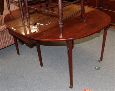 Lot 476 - A George III mahogany gate-leg dining table