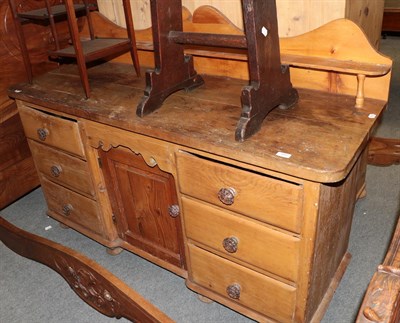 Lot 491 - A Victorian pine sideboard with six drawers around a cupboard door, 160cm wide