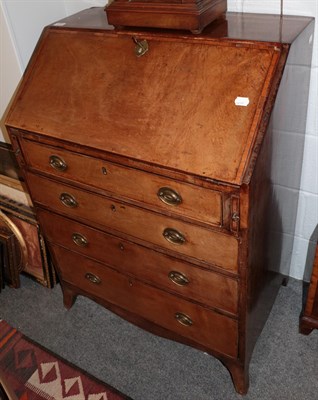 Lot 512 - A 19th century crossbanded mahogany bureau (a.f.)