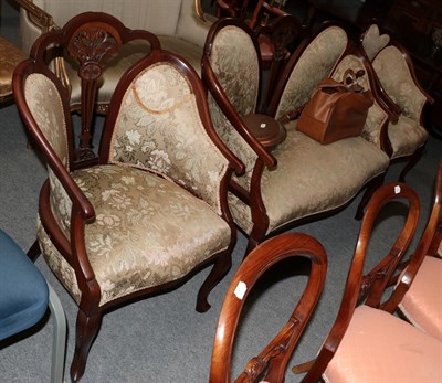 Lot 526 - A three piece mahogany framed salon suite comprising a sofa and two chairs