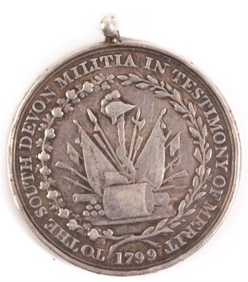 Lot 43 - A South Devon Militia Medal of Merit 1799, the obverse with a trophy of arms enclosed by a...
