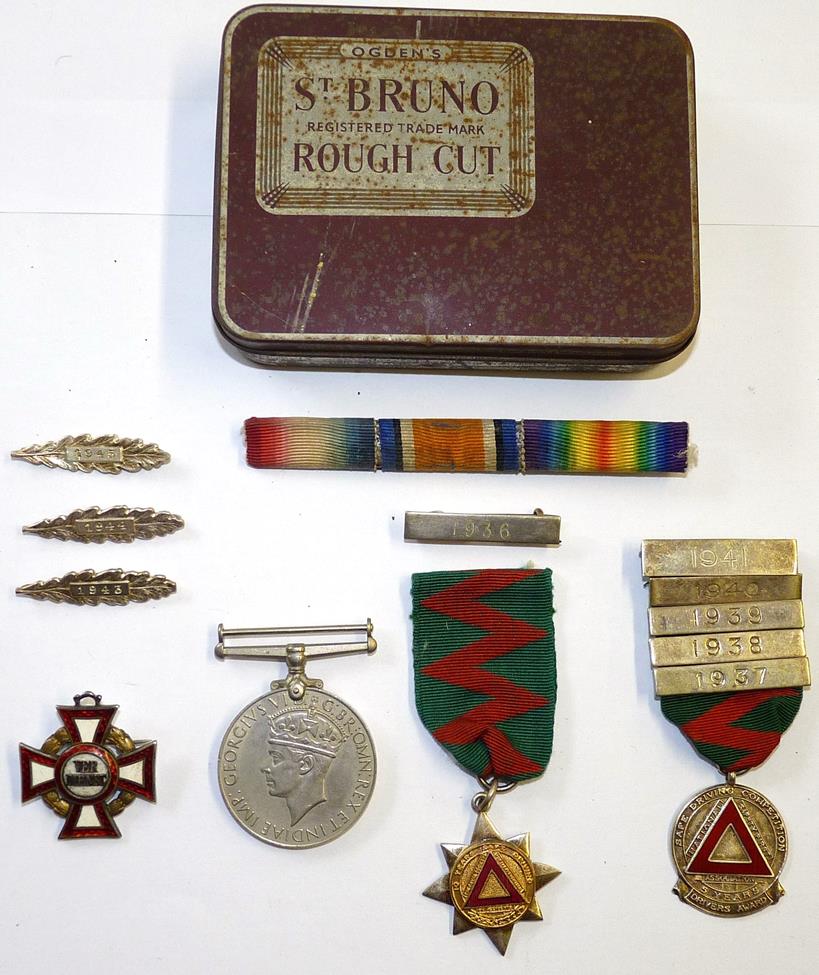 Lot 47 - A First World War Austrian Military Merit Cross, with brooch pin fastening; also, a 1939-45 War...