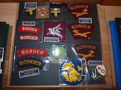 Lot 57 - A Collection of Militaria Relating to the Border Regiment, comprising cap and collar badges,...