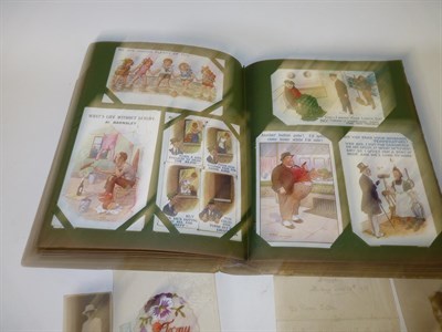 Lot 65 - An Early 20th Century Postcard Album, containing many First World War battlefield scenes,...