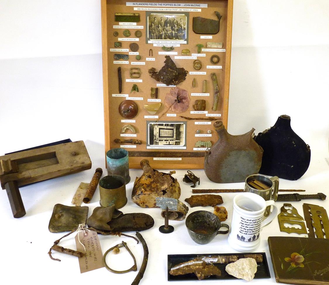 Lot 75 - A Quantity of Militaria, comprising First and Second World War battlefield relics including a...