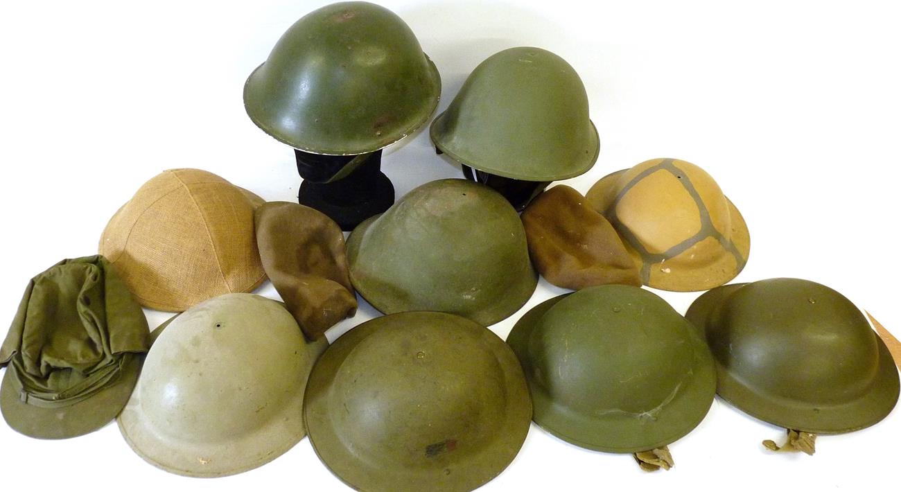 Lot 87 - Three British Mk.III Army Helmets, two with later Lift-the-Dot liners, one lacking liner; six...