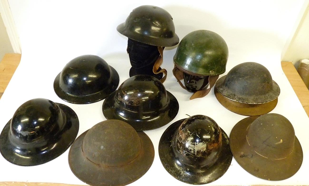 Lot 88 - A British Second World War Despatch Rider's Helmet, with bottle green paint, with cushioned leather