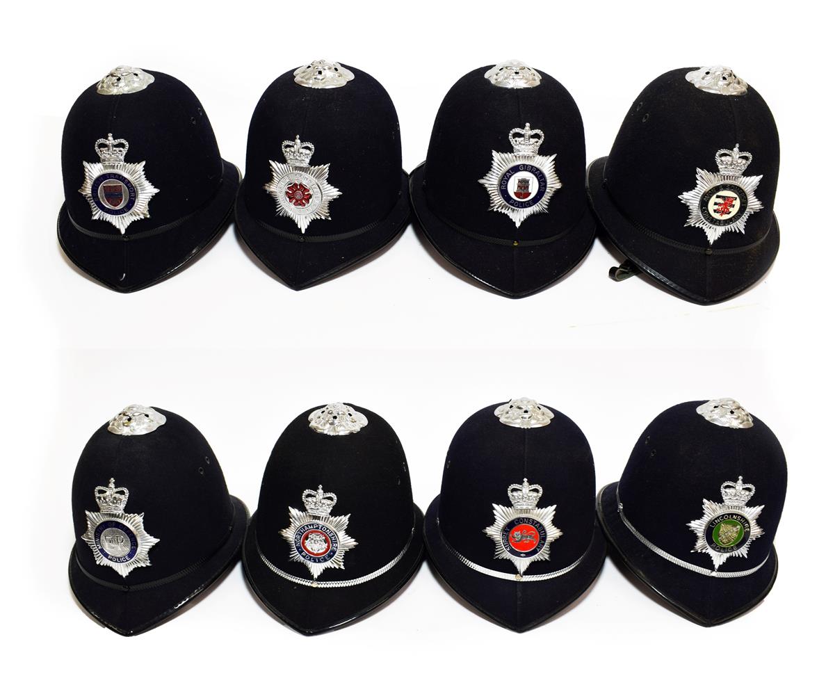 Lot 89 - Eight Elizabeth II Police Custodian Rose Top Helmets, with chrome and enamel helmet plates to:-...