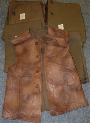 Lot 97 - A Second World War Leather Jerkin, with green wool blanket lining and four brown plastic...