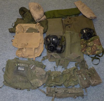 Lot 99 - A Quantity of British Army Surplus Equipment, circa 1950's, including four rubberized rain capes, a