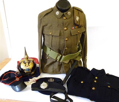 Lot 101 - A First World War Corporal's Khaki Tunic to the Border Regiment, with brass buttons and...