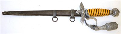 Lot 115 - A German Third Reich Luftwaffe Dagger, 2nd Pattern, the 25cm double edge steel blade etched...