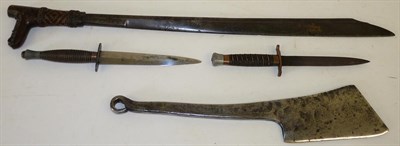 Lot 123 - A 19th Century Borneo Mandau, the 53cm single edge steel blade inlaid at the ricasso with mata...
