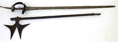 Lot 130 - An 18th Century Indian Khanda, the 88cm single edge steel blade with a narrow fuller along the back