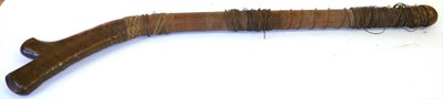 Lot 133 - A 19th Century Fijian Gun Stock War Club, of hard dense golden brown wood, with raised medial ridge