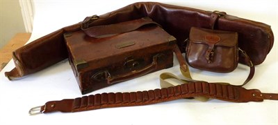 Lot 138 - A Stitched Leather Cartridge Case, with rolled leather carrying handles, brass angles, and...