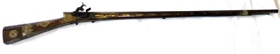 Lot 147 - A 19th Century Turkish Miquelet Musket, the 99cm steel barrel octagonal at the breech, struck...