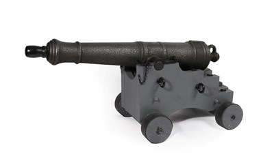 Lot 151 - A 1795 Cast Iron One Pounder Cannon, the ringed barrel measuring 79cm from muzzle to touch...