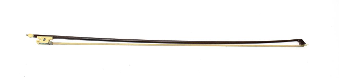 Lot 2026 - Violin Bow stamped 'Pecatte' [sic] ivory frog and button, length excluding button 720mm, weight 59g
