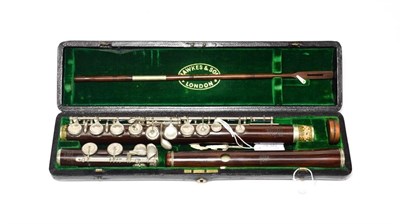 Lot 2030 - Hawkes & Son Flute wooden stamped 'Excelsior Sononous Class, Hawkes & Son Makers London 9043', head